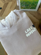 Load image into Gallery viewer, Blush hoodie lake okoboji w/ navy heart
